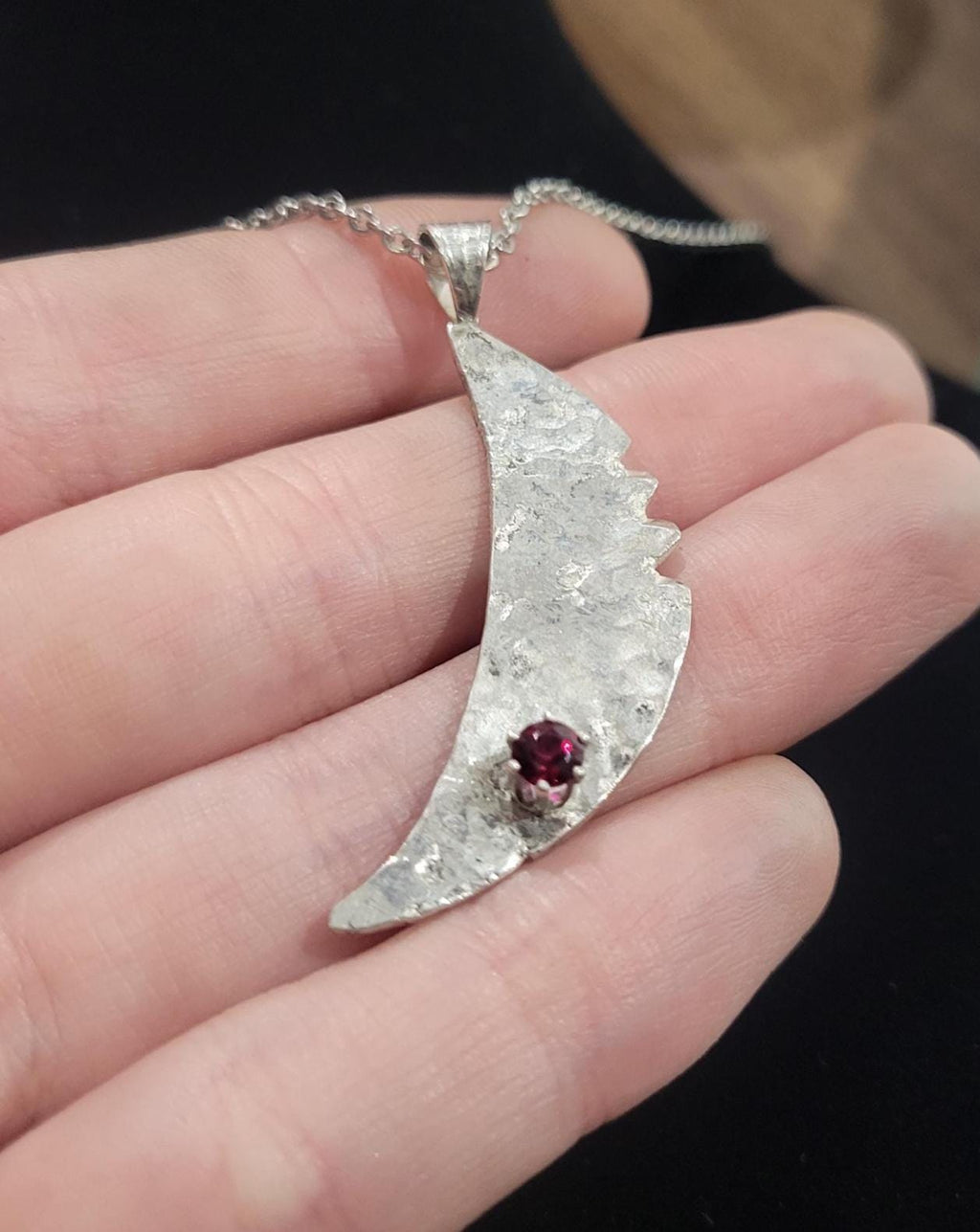 Sterling Silver Cresent Moon with a Faceted South Carolina Garnet