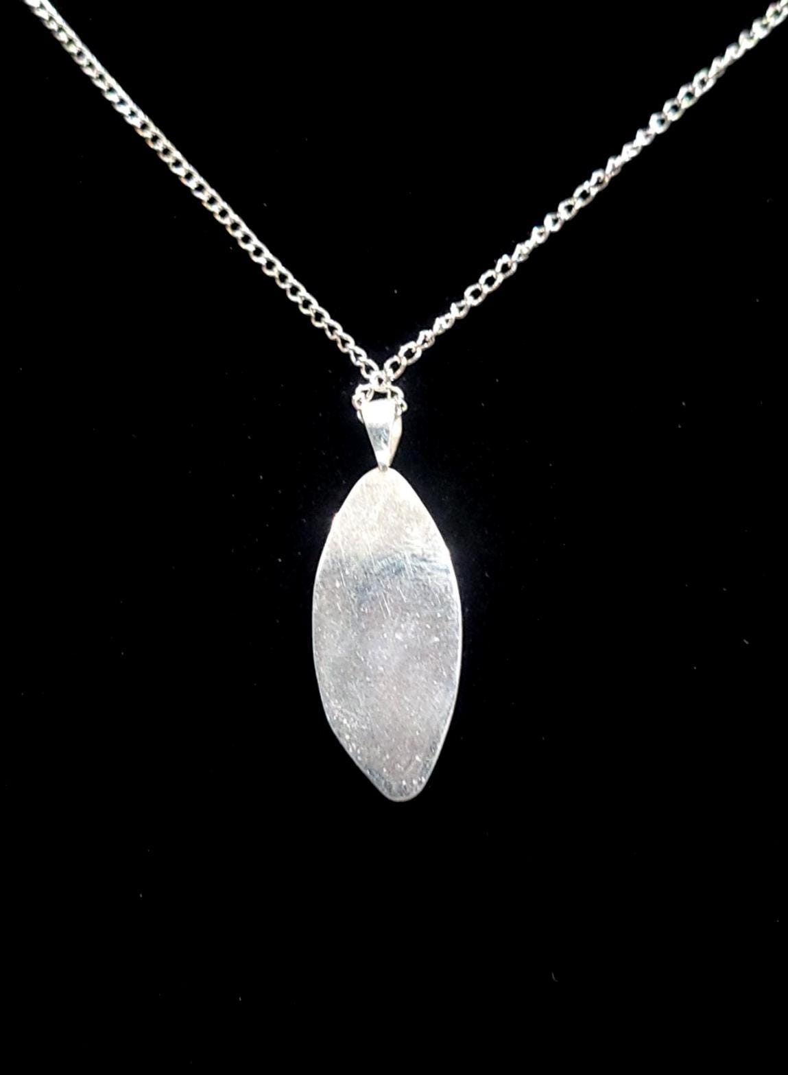 Sagenite Agate Pendant in a Sterling Silver Bezel made in the USA