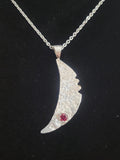 Sterling Silver Cresent Moon with a Faceted South Carolina Garnet