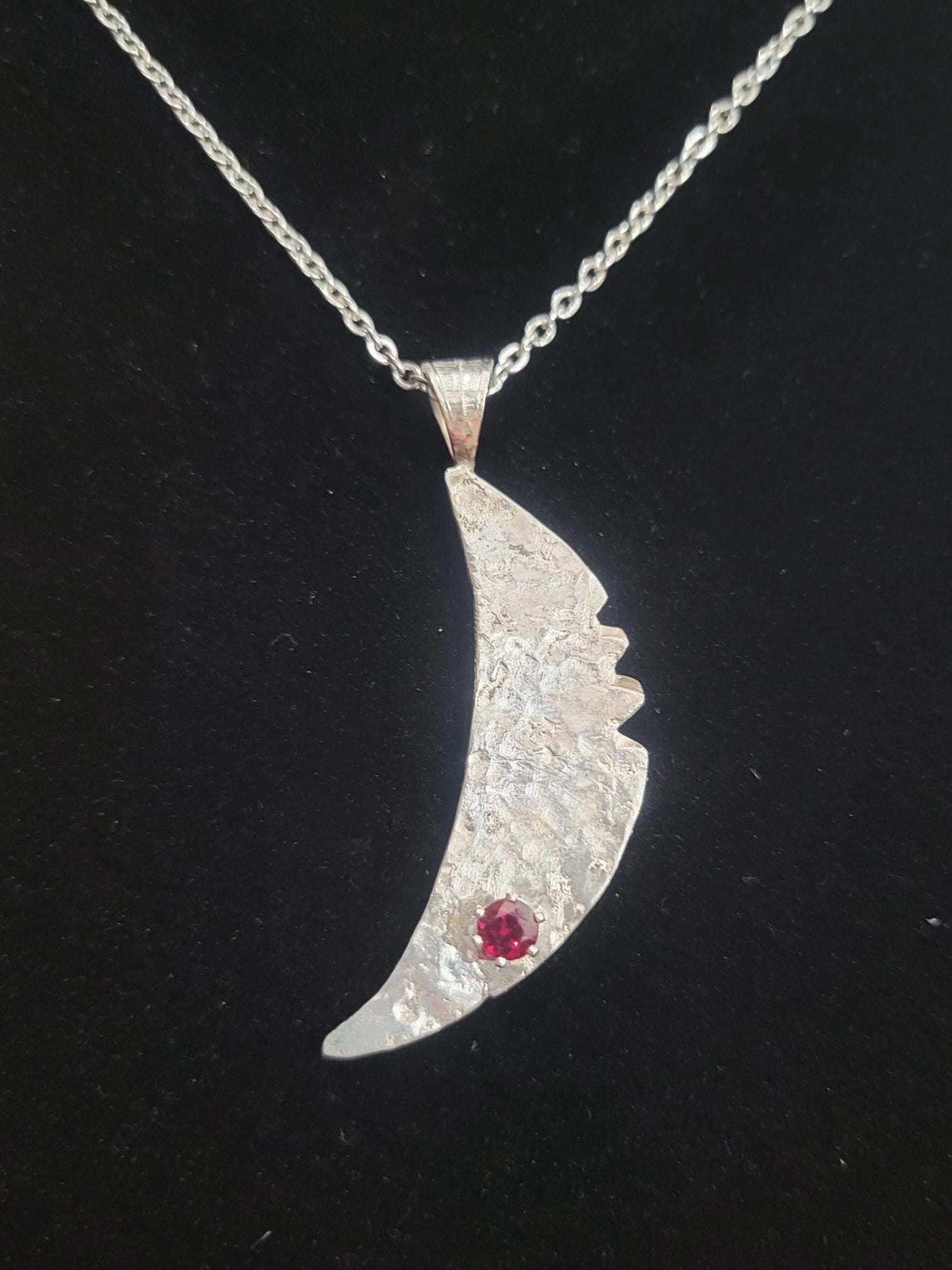 Sterling Silver Cresent Moon with a Faceted South Carolina Garnet