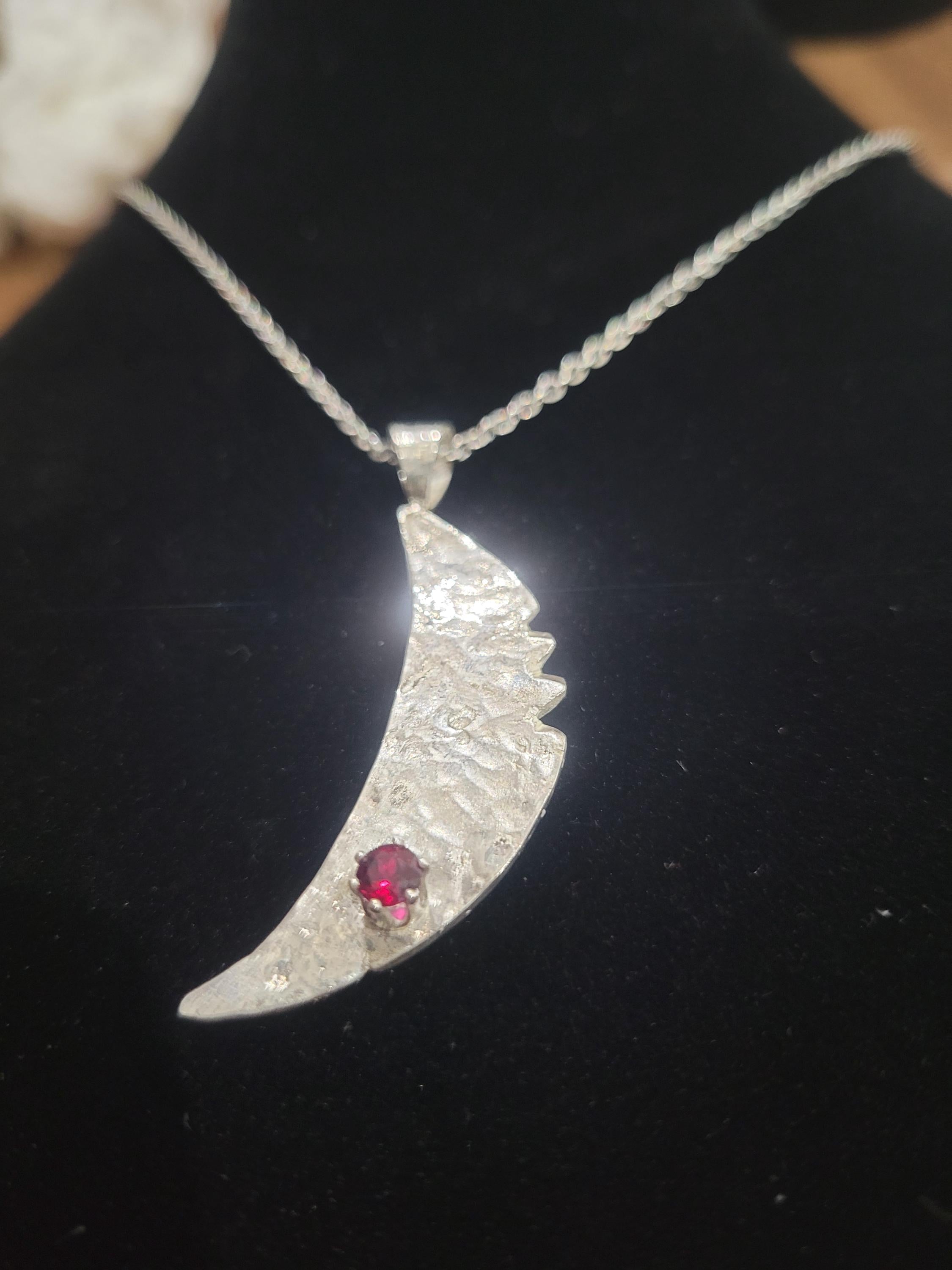 Sterling Silver Cresent Moon with a Faceted South Carolina Garnet