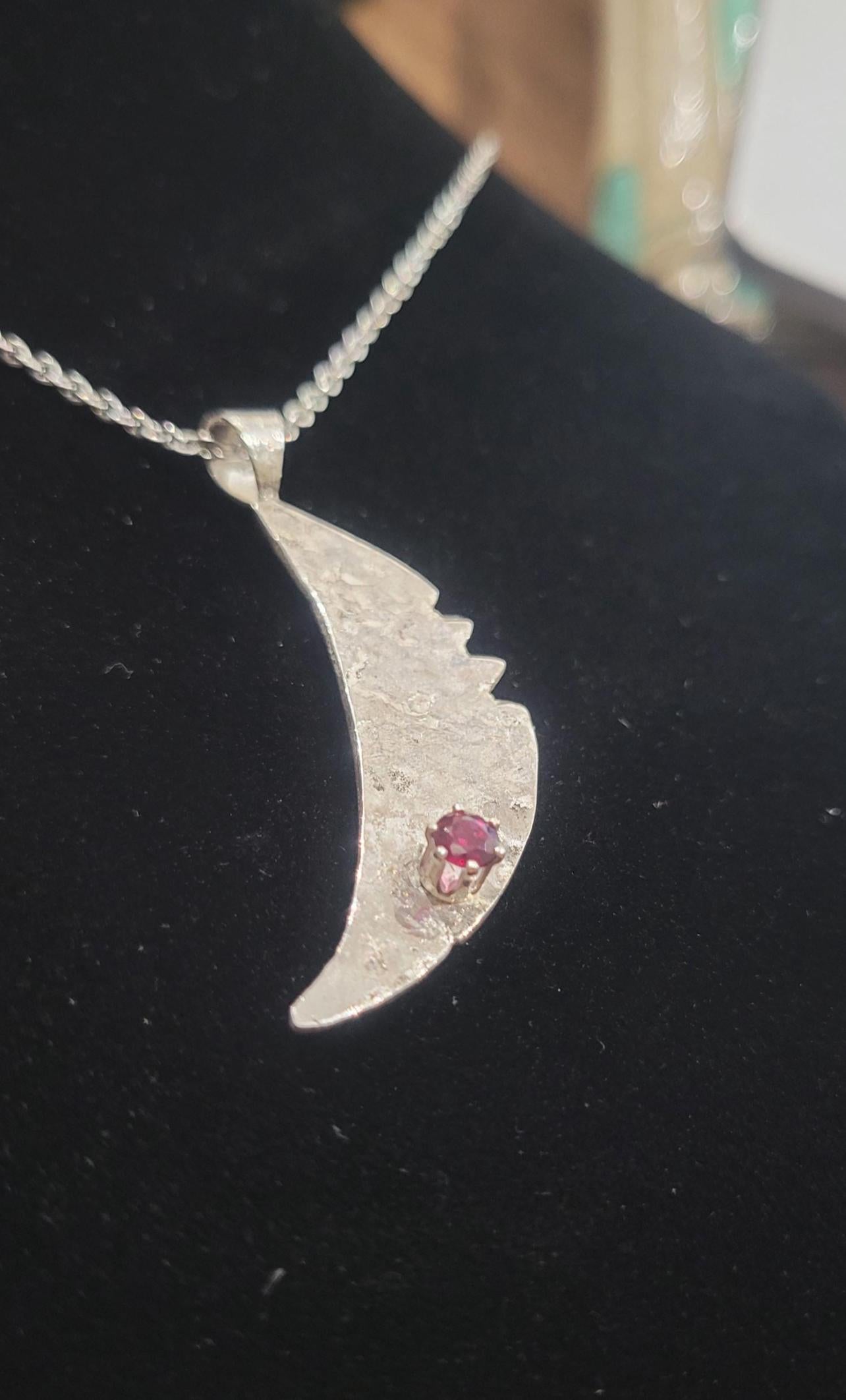 Sterling Silver Cresent Moon with a Faceted South Carolina Garnet
